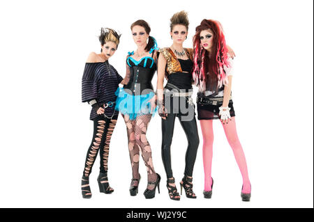 Portrait de tous les groupe de rock féminin posing together over white background Banque D'Images