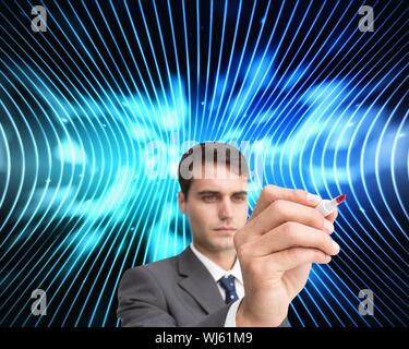 Composite image of businessman holding marker sur fond noir à rayures bleu futuriste Banque D'Images