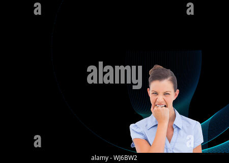 Composite image of businesswoman looking at the camera Banque D'Images