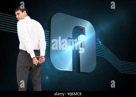 Composite image of businessman wearing handcuffs Banque D'Images