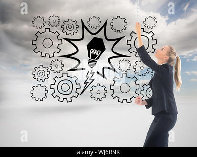 Image composite de blond businesswoman pulling une chaîne Banque D'Images