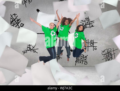 Image composite de trois militants de l'environnement et de saut smiling on white background Banque D'Images