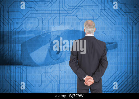 Composite image of serious businessman posing Banque D'Images