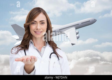 Image composite de portrait of female nurse holding out ouvrir palm Banque D'Images