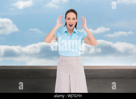 Composite image élégant businesswoman posing Banque D'Images