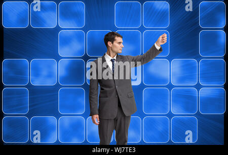 Image composite de stern attractive businessman pointing Banque D'Images