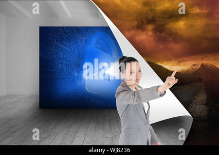 Composite image of asian businesswoman pointing Banque D'Images