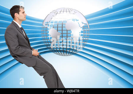 Composite image of young businessman sitting Banque D'Images