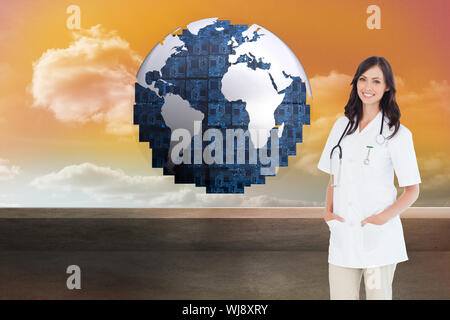 Image composite de confident female doctor standing en face de la fenêtre tout en souriant Banque D'Images