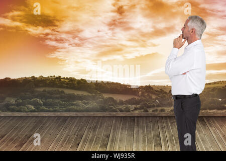 Composite image of businessman posing on white background Banque D'Images