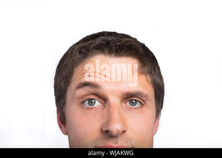 Portrait d'un homme aux yeux vert sensibilisation eyebrow Banque D'Images