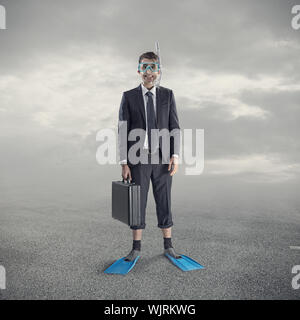 Businessman wearing plongée masque et des palmes. Banque D'Images