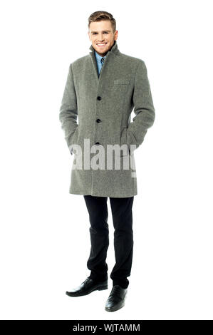 Young businessman wearing trendy overcoat Banque D'Images