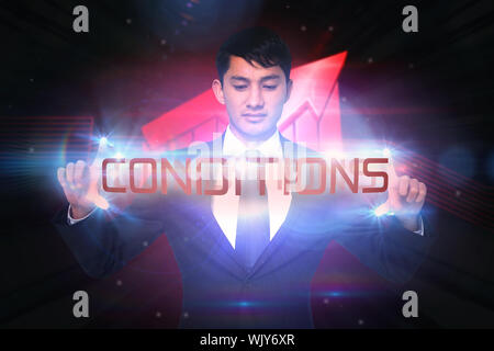 La parole et les conditions of unsmiling businessman holding contre tourbillon lumineux sur fond noir Banque D'Images