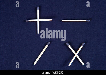 Symbole mathématique fabriqué avec un matchstick Banque D'Images