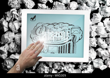 Image composite de hand touching tablet showing business brainstorm doodle Banque D'Images