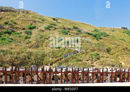 Une vue sur la plage et falaises de l'ouest en Amérique du chemin d'accès à Mundesley Norfolk, Norfolk, Angleterre, Royaume-Uni, Europe. Banque D'Images