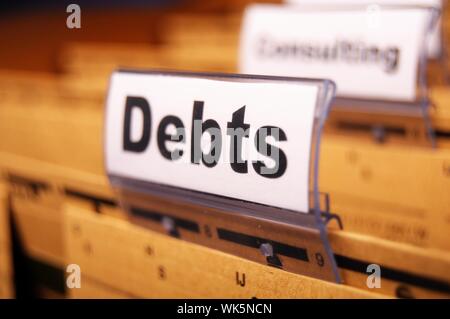 Dept mot sur le dossier d'affaires montrant finances ou concept financier Banque D'Images