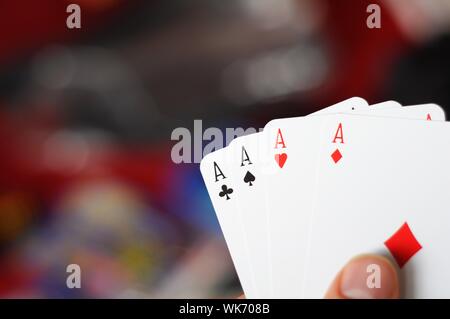 Quatre As et bokeh copyspace pour votre message texte Banque D'Images