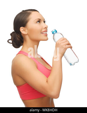 Photo de femme sportive avec une bouteille d'eau Banque D'Images