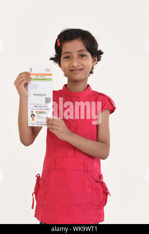 Girl showing an Aadhar card Stock Photo