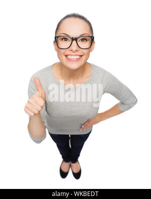 Asian Woman in eyeglasses showing Thumbs up Banque D'Images