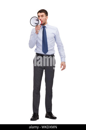 Les entreprises, la communication et l'office concept - angry businessman with megaphone Banque D'Images