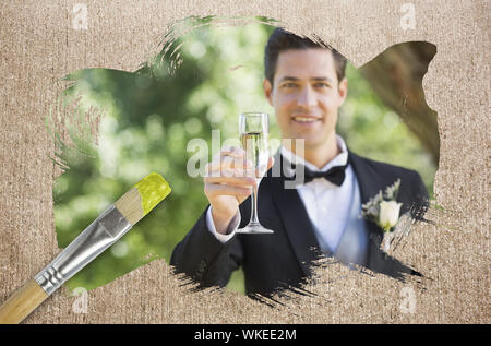 Image composite de groom toasting with champagne avec le pinceau trempé dans le jaune contre la surface altérée Banque D'Images