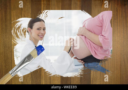 Image composite de femme enceinte à vérifier avec un pinceau trempé dans du médecin contre bleu surface en bois avec des planches Banque D'Images