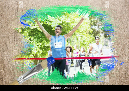 Image composite de racer crossing ligne d'arrivée avec le pinceau trempé dans la surface altérée contre bleu Banque D'Images