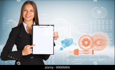 Businesswoman holding porte-papier. Fil High-tech-frame graphiques en toile et pignons Banque D'Images