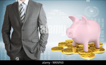 Businessman with piggy bank et les pièces d'or. Textes et graphiques en toile Banque D'Images