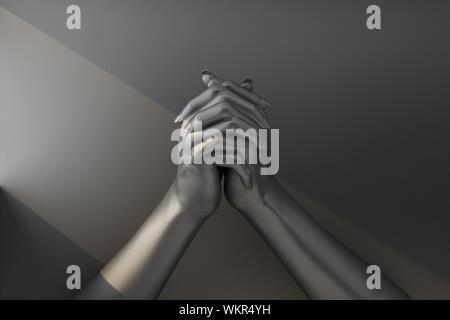 Deux mains noires attaché dans un geste de prière. Le rendu 3D Banque D'Images