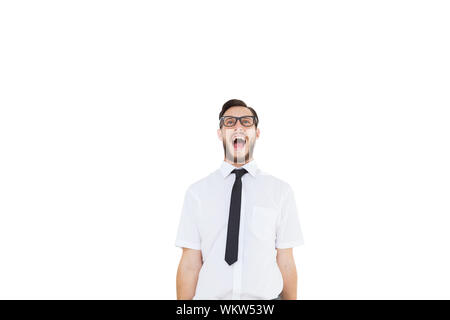 Geeky young businessman criant bruyamment sur fond blanc Banque D'Images