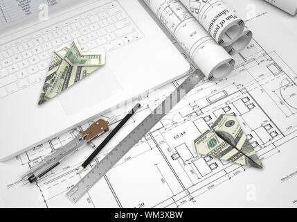 Avions en papier de dollars couché sur le clavier d'ordinateur portable et des dessins architecturaux. Les outils sont à proximité. Concept d'affaires de bâtiment Banque D'Images
