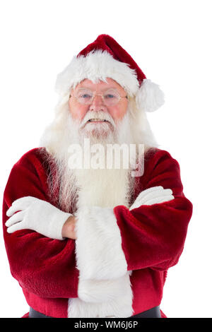 Santa sourit avec bras croisés sur fond blanc Banque D'Images