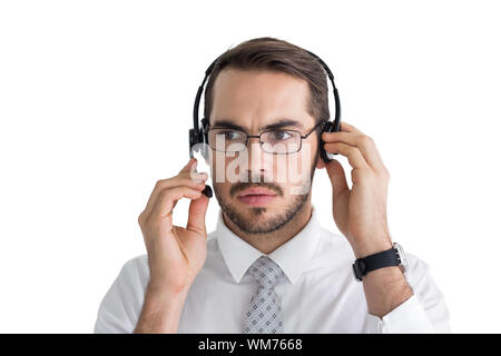 Portrait d'un homme d'affaires ciblées avec casque sur fond blanc Banque D'Images