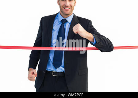 Happy businessman crossing arrivée sur fond blanc Banque D'Images