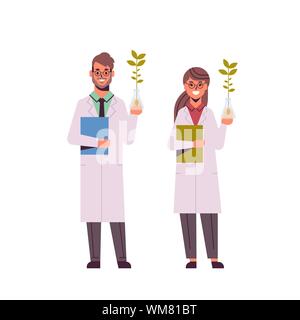 Deux scientifiques examinant des échantillons de plantes dans des tubes à essai homme femme en uniforme faisant des expériences en laboratoire de génétique La recherche sciences concept chimique pleine Illustration de Vecteur