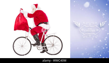 Santa vélo et tenant son sac contre vignette pourpre Banque D'Images
