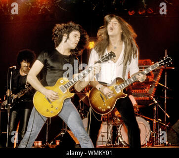 Phil Lynott, Gary Moore et Scott Gorham de Thin Lizzy sur scène au Palladium de New York en septembre, 1978 Banque D'Images