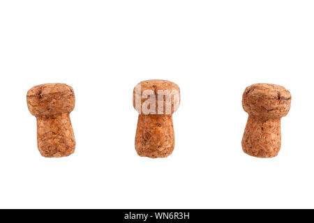 Trois bouchons de champagne ou de vin mousseux liège bouteilles isolé sur fond blanc close up Banque D'Images