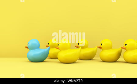 Concept de leadership : jaune canards en caoutchouc avec rendu 3D leader bleu Banque D'Images