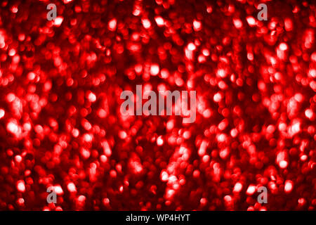 Bokeh flou rouge brillant glitter background, rouge foncé de flou artistique, conception décor chatoyant rouge brillant lumineux bulles ronde effet flou, copy space Banque D'Images