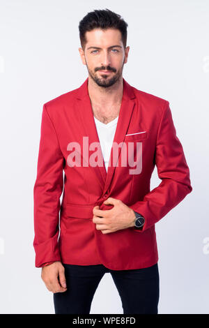 Portrait of young handsome businessman barbu en habit rouge Banque D'Images