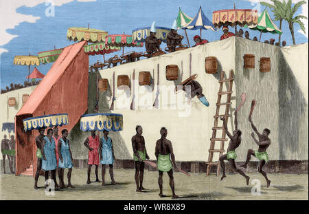 La douane annuel du Dahomey. La principale célébration annuelle dans le royaume de Dahomey (Bénin), actuellement tenue à la capitale, Abomey, au début de l'automne comme un hommage à l'esprits invisibles. A cette époque, les taxes ont été recueillies, le prix a été fixé en monnaie actuelle, les commandants militaires et civils ont été nommés, les bonnes actions sont récompensées et les criminels étaient sévèrement punis, à partir de laquelle les victimes destinées à la douane annuel ont été choisis. Sur le jour où ils figuraient sur une plate-forme haute et, dans des corbeilles, ont été jetés dans le vide, mourir décapités par les bourreaux. Gravure de Capuz. La J Banque D'Images