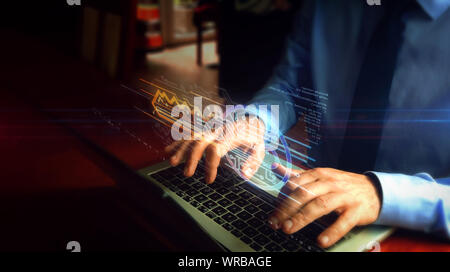 Man typing on laptop avec cyber sécurité avec hologramme symbole de clé sur l'écran du clavier. Concept de sécurité informatique, le cryptage et la protection par mot de passe. Banque D'Images