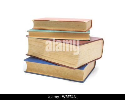 Pile de livres multicolores isolé sur blanc. Banque D'Images