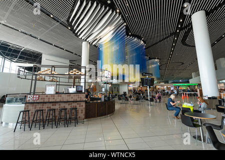 Auckland International Airport Terminal shopping et repas. Banque D'Images
