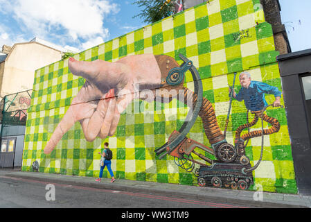 Street art par Ron Martin, Shoreditch, London, UK Banque D'Images